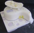 Teardrop shaped christening cake