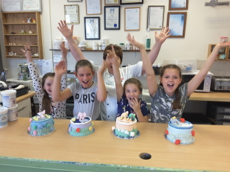Cake decorating workshop for children celebrate their success