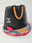 Picture of a classy black handbag cake 