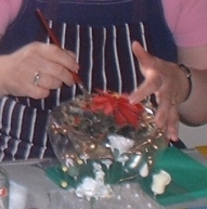 Yvonne O'Neill demonstrating making a pointsettia